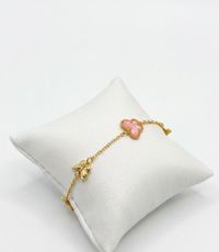 Foto do produto PULSEIRA REGULÁVEL BORBOLETA COM RESINA ROSA BANHADO EM OURO 18K