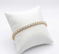 Foto do produto PULSEIRA REGULAVEL RIVIEIRA CRAVEJADO COM ZIRCÔNIAS LILAS BANHADO A OURO 18K