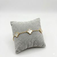 Foto do produto PULSEIRA REGULÁVEL TREVO PEROLADO BANHADO EM OURO 18K