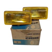 Foto do produto PAR DE BLOCO DO FAROL AUXILIAR MILHA NEBLINA EURO SERRA AMARELO ORIGINAL CIBIÉ 044113