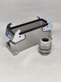 Foto do produto BTM-24SGR - BASE ALTA - TRAVA LATERAL (QUATRO PINOS) - SAIDA LATERAL + PRENSA CABO PG21 PARA TOMADAS MULTIPOLARES