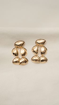 BRINCO METAL CONCHAS