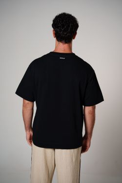 camiseta over box pare respire preto
