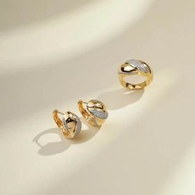 Imagem do produto Brinco argola click com design retorcido e detalhes com zircônias folheado a ouro 18k
