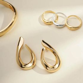 Imagem do produto Brinco 4cm com design de gota curvada folheado a ouro 18k
