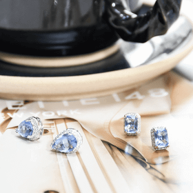 Imagem do produto Brinco com cristal retangular Roxo Tanzanita com cravação de zircônias em volta em prata 925