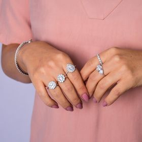 Imagem do produto Anel Moissanite 6X9mm Gota com Cravação na Volta e Aro Meio Cravejado em Prata 925
