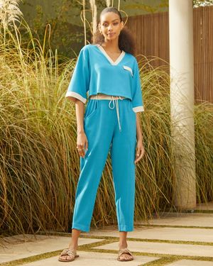 Conjunto Blusa e Calça Bicolor Detalhe Pespontos