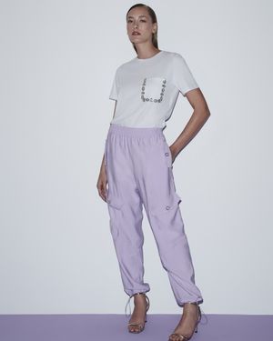 T-Shirt Bolso com Aplicação Flores