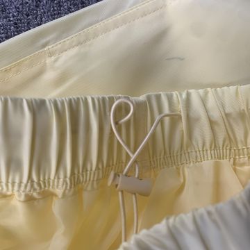 Foto do produto Bermuda Fear of God Essentials Nylon Running Shorts Cream
