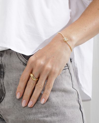 Pulseira dourada riviera com fecho chambala