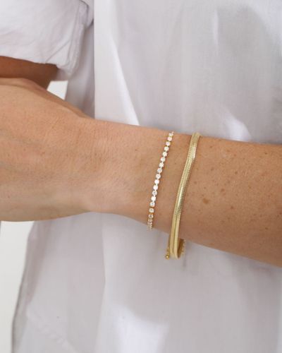 Pulseira dourada riviera com fecho chambala