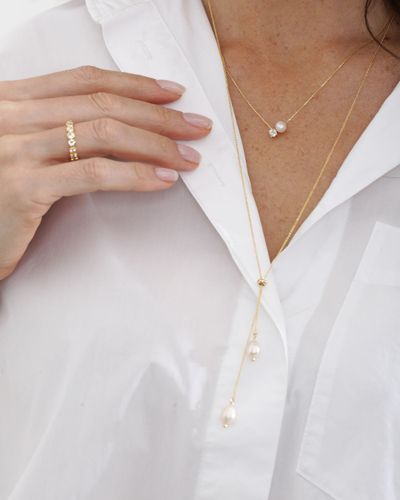Colar dourado longo fecho chambala e pérola