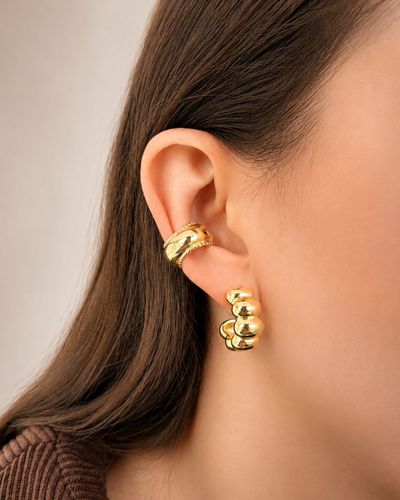 Piercing fake dourado liso com bolinhas