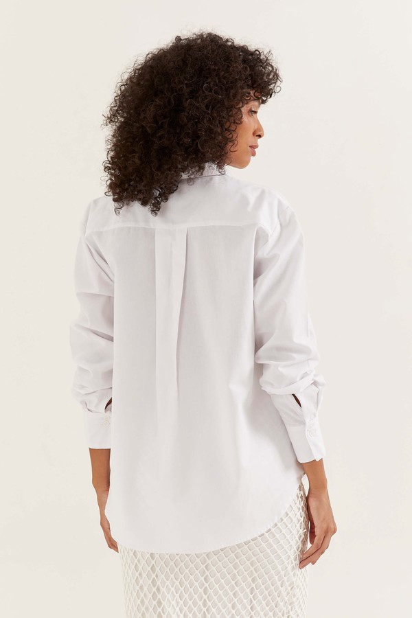 Foto do produto camisa básica ampla algodão capri