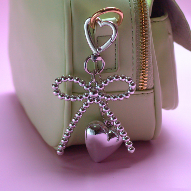 Chaveiro Charm Coração com Laço