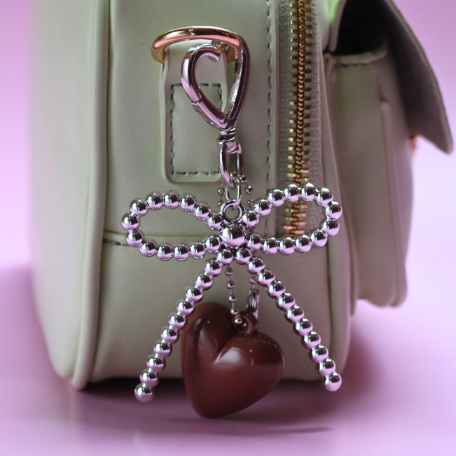 Chaveiro Charm Coração com Laço