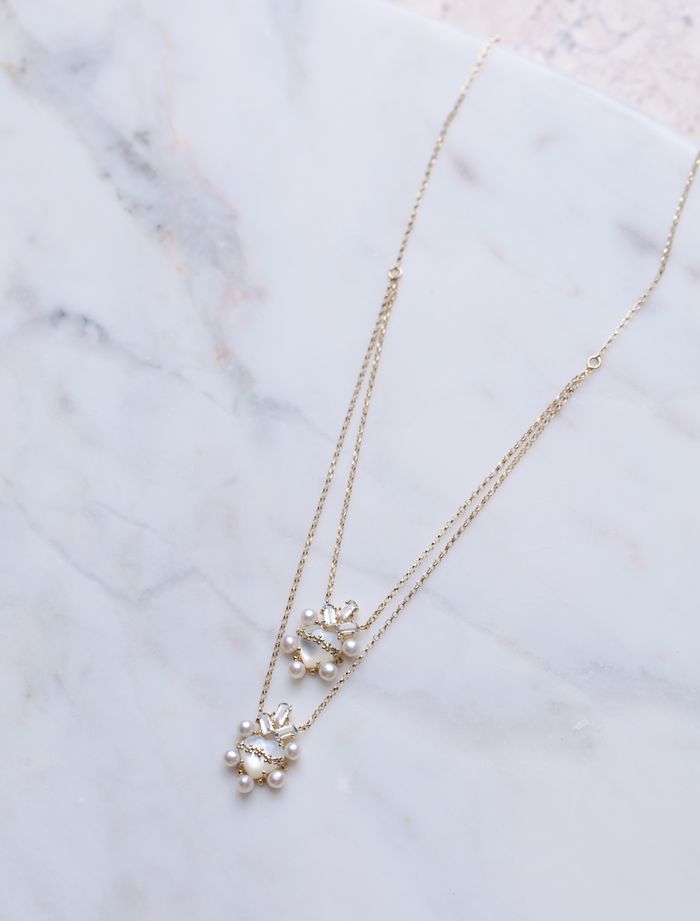 Colar de ouro com topázios, pérolas e madrepérolas