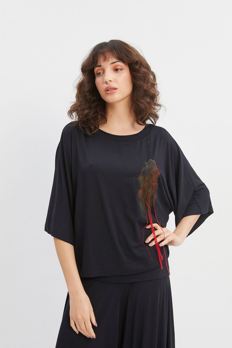 Blusa malha aplic linha lateral