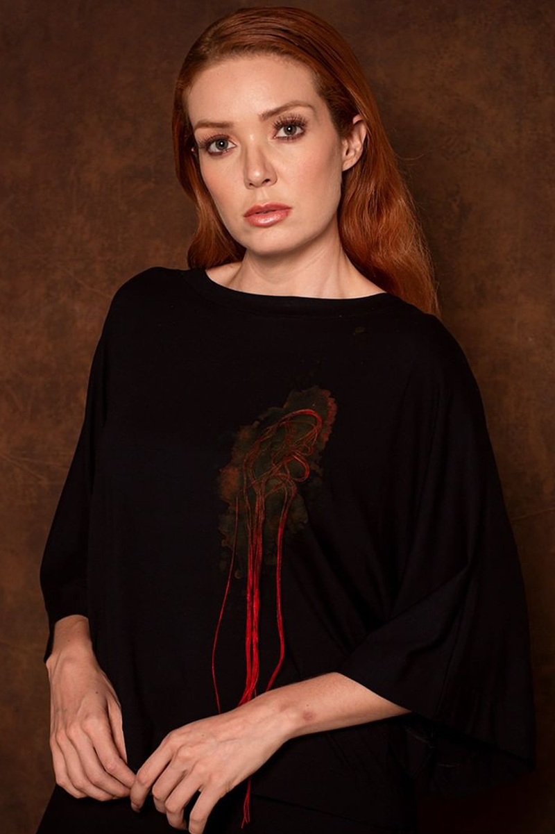 Blusa malha aplic linha lateral