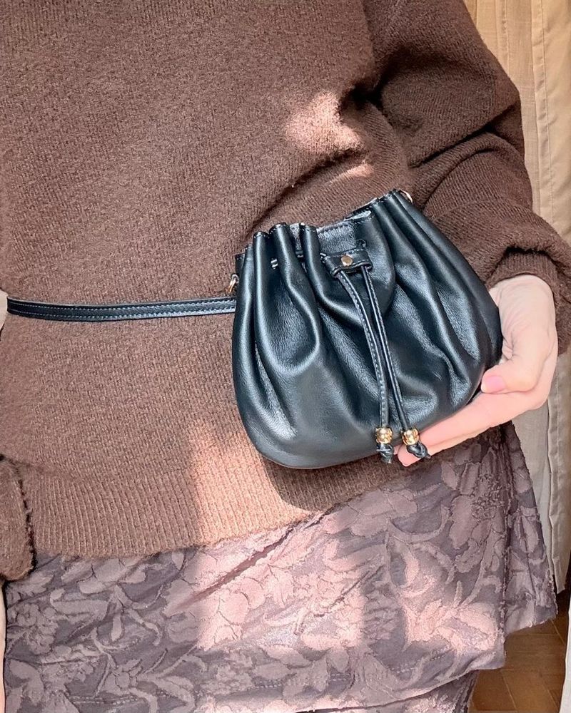 Bolsa-pochete Shell Preta