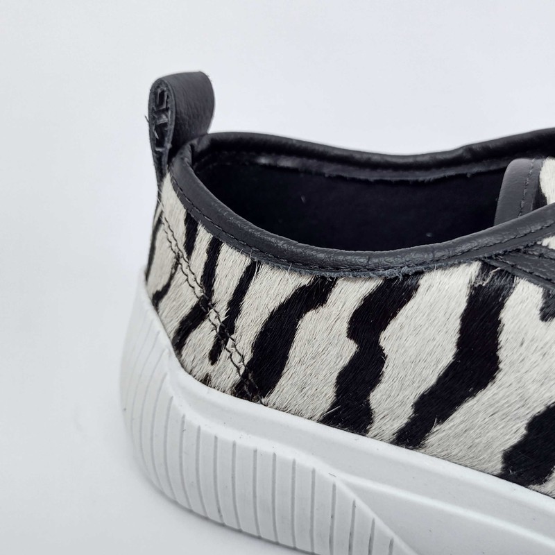 TENIS MC COURO ANIMAL PRINT