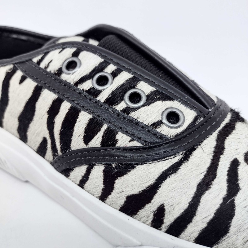 TENIS MC COURO ANIMAL PRINT