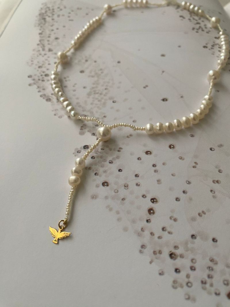 COLAR TERÇO DE PÉROLAS E ESPIRITO SANTO OURO AMARELO