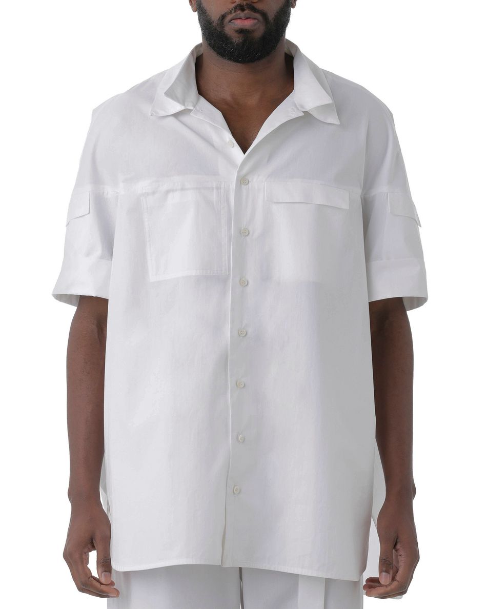Camisa bolsos Nando Branco