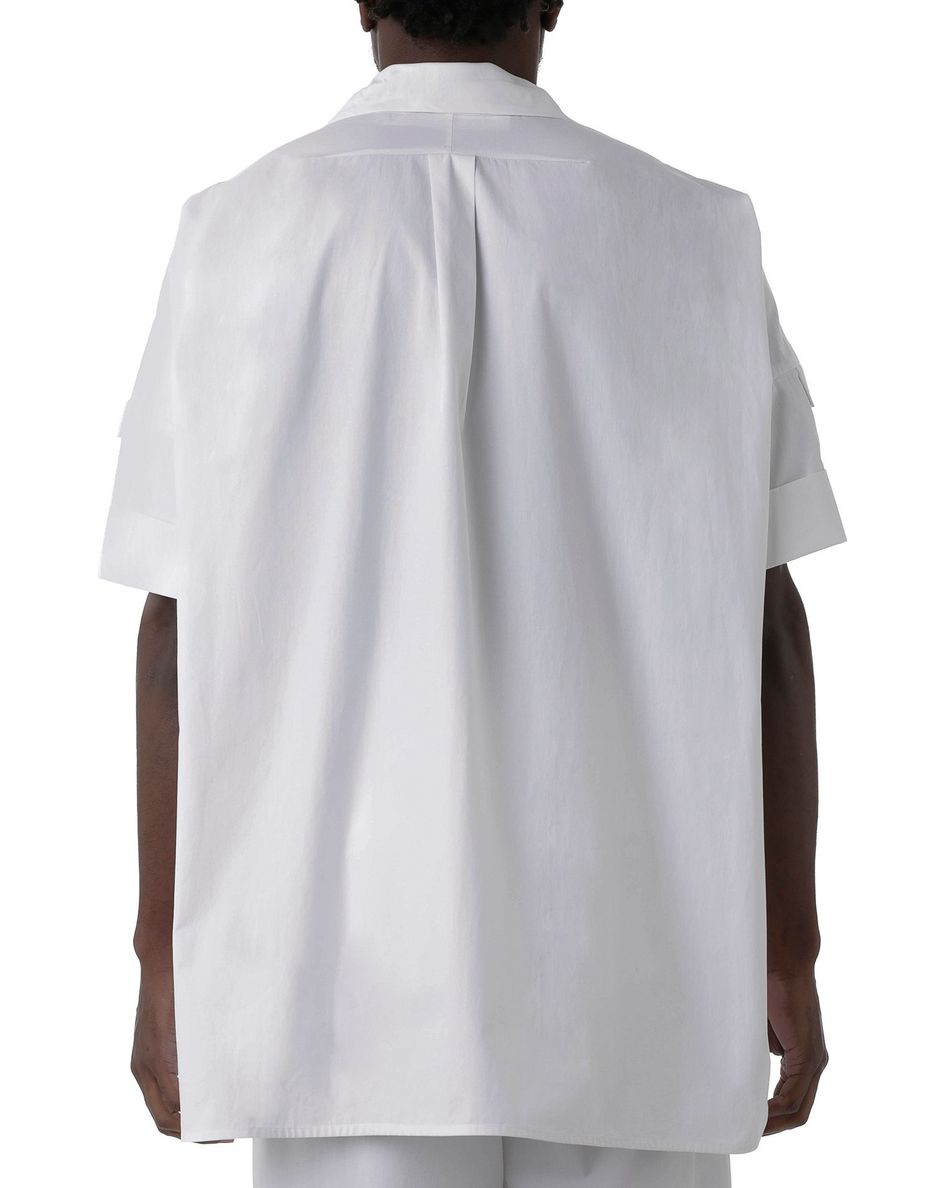 Camisa bolsos Nando Branco