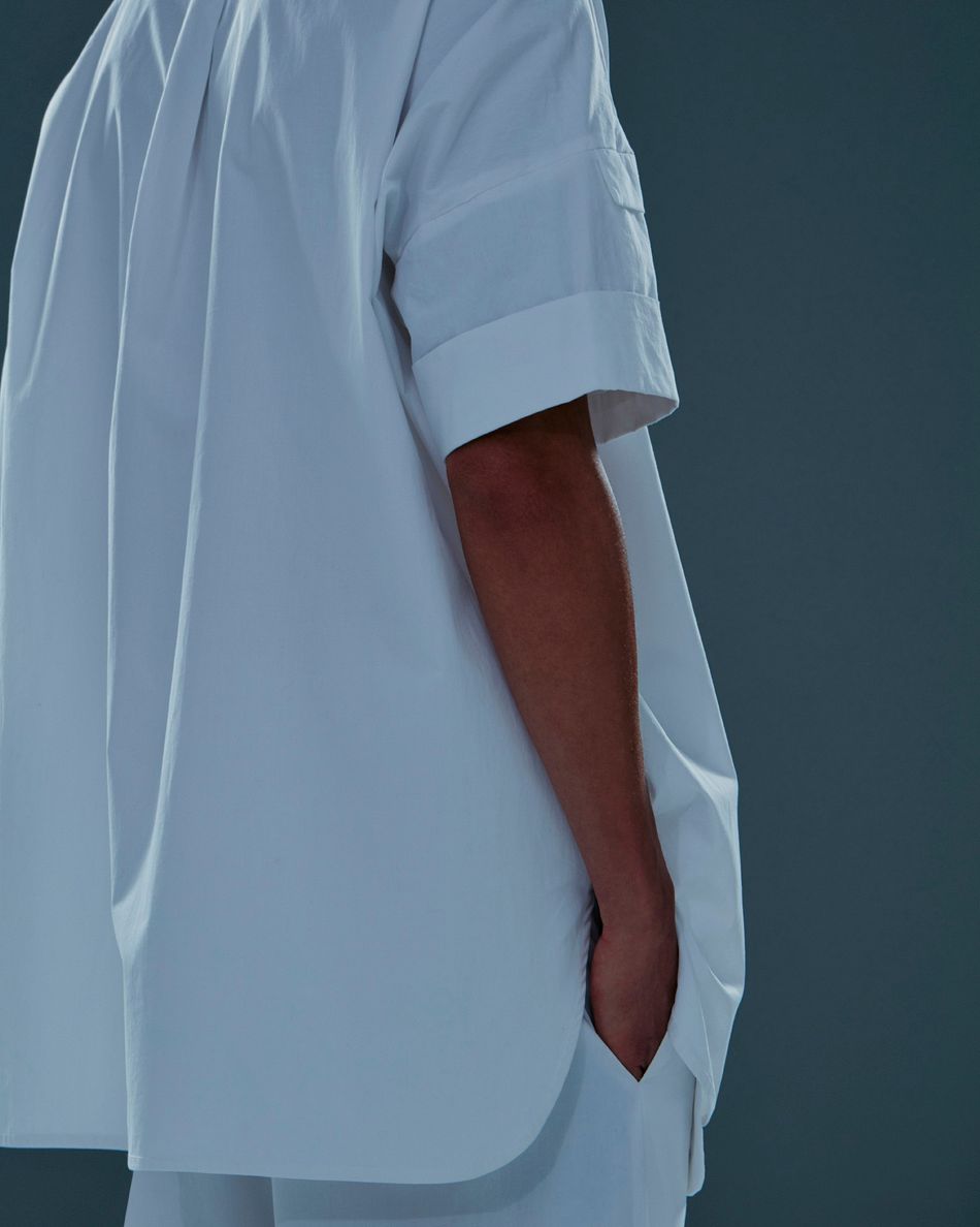 Camisa bolsos Nando Branco