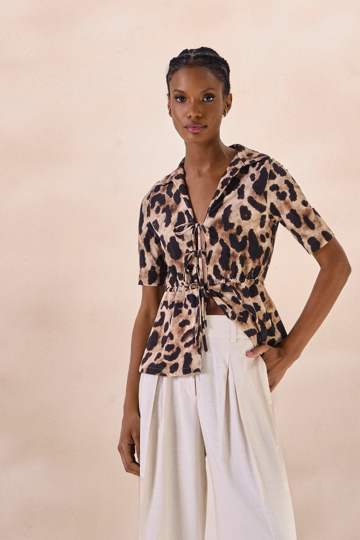 Foto do produto Blusa Peplum Mabelle Estampa Onça